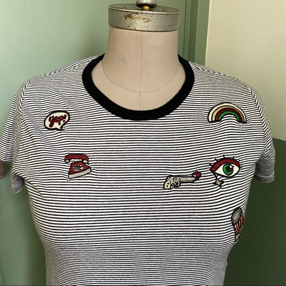 T shirt with embroidered patches